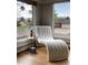 Cozy reading nook with large windows offering scenic views at 26 Morningside Dr, Wheat Ridge, CO 80215