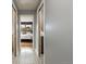 Hallway with patterned tile floors leading to the bedroom and bathroom at 26 Morningside Dr, Wheat Ridge, CO 80215