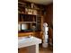 Bright home office featuring custom built-ins and modern decor at 26 Morningside Dr, Wheat Ridge, CO 80215
