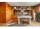 Charming home office with custom wooden built-ins and eclectic decor at 26 Morningside Dr, Wheat Ridge, CO 80215