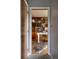 Inviting home office with wood built-ins, zebra rug, and warm, natural light at 26 Morningside Dr, Wheat Ridge, CO 80215