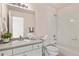 Bright bathroom with a vanity and combined tub and shower at 4574 S Cimmarron Cir # B, Aurora, CO 80015