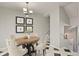 Cozy dining area featuring an oval table, stylish chairs, and modern decor at 4574 S Cimmarron Cir # B, Aurora, CO 80015