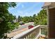 Serene street view from the balcony with lush trees at 4574 S Cimmarron Cir # B, Aurora, CO 80015