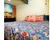 Close up on a bedroom with plush queen-size bed and comfortable pillows at 8211 Rocky Mountain Dr, Lakewood, CO 80214