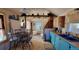 Open concept kitchen with wood cabinets, wood countertops and views of the dining area at 8211 Rocky Mountain Dr, Lakewood, CO 80214