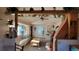 Bright and airy living room with vaulted ceilings, exposed wood beams, and a cozy seating area at 8211 Rocky Mountain Dr, Lakewood, CO 80214