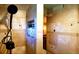 Modern shower with tiled walls, built-in niche, and updated showerhead at 8211 Rocky Mountain Dr, Lakewood, CO 80214