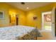 Bright bedroom with an ensuite bathroom and charming, traditional decor at 400 S Steele St # 13, Denver, CO 80209