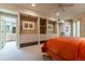 Spacious bedroom with built-in shelving and an orange comforter at 400 S Steele St # 13, Denver, CO 80209