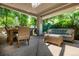 Covered patio area with seating and dining furniture provides lots of space to entertain at 400 S Steele St # 13, Denver, CO 80209