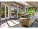 Spacious covered patio with dining and seating areas offers great outdoor living at 400 S Steele St # 13, Denver, CO 80209