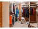 Spacious walk-in closet with custom shelving provides lots of storage space at 400 S Steele St # 13, Denver, CO 80209