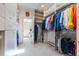 Organized walk-in closet with ample shelving and hanging space at 400 S Steele St # 13, Denver, CO 80209