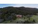 Secluded mountain estate featuring mature trees, open meadows, and stunning mountain views at 15533 S Perry Park Rd, Palmer Lake, CO 80133