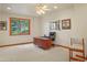 Office space featuring a desk, chair, and picture window with stunning views at 15533 S Perry Park Rd, Palmer Lake, CO 80133