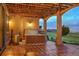 Covered patio with hot tub and beautiful views at 15533 S Perry Park Rd, Palmer Lake, CO 80133