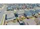 Birds-eye view showing backyard with deck and patio furniture and neighborhood homes with fenced yards and landscaping at 25062 E Cedar Pl, Aurora, CO 80018