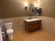 Neutral bathroom featuring modern sink, fixtures and tile at 3872 S Dallas St # 7-107, Aurora, CO 80014
