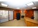 Cozy office features a fireplace, Bighorn safe, built-in cabinets, and natural light at 3872 S Dallas St # 7-107, Aurora, CO 80014