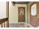 Welcoming entrance to unit 4043, featuring a cozy porch and well-maintained exterior at 4843 Silver Spruce Ln, Evergreen, CO 80439