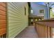 Charming condo building with welcoming walkway and well-maintained exterior; multiple units with individual entrances at 4843 Silver Spruce Ln, Evergreen, CO 80439