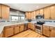 Well-lit kitchen with stainless steel appliances and hardwood floors, designed for functionality at 1525 E 133Rd Ave, Thornton, CO 80241