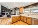 Modern kitchen with light wood cabinets, offering a spacious and stylish cooking area at 1525 E 133Rd Ave, Thornton, CO 80241