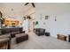 Open floor plan with vaulted ceilings, hardwood floors, and plenty of natural light at 1525 E 133Rd Ave, Thornton, CO 80241