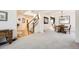 Open-concept living area with staircase and dining area, perfect for entertaining at 1525 E 133Rd Ave, Thornton, CO 80241