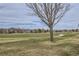 Beautiful yard offering green space with walking paths, residential properties, and mountain views at 1525 E 133Rd Ave, Thornton, CO 80241