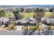 Beautiful aerial shot of the home, neighborhood, and golf course views at 26 Wedge Way, Littleton, CO 80123