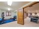 Well-equipped home gym featuring free weights, exercise bench, and access to the finished basement at 26 Wedge Way, Littleton, CO 80123