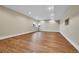 Large finished basement area with recessed lighting and a bright window at 1148 Hillside Ln, Louisville, CO 80027