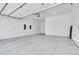 Clean, spacious garage with a pristine white interior and ample room for parking and storage at 1148 Hillside Ln, Louisville, CO 80027