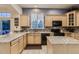 Spacious kitchen with granite countertops, black appliances, and tiled backsplash at 3120 Redhaven Way, Highlands Ranch, CO 80126