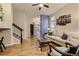 Inviting living room with hardwood floors and comfortable seating, bathed in natural light at 3120 Redhaven Way, Highlands Ranch, CO 80126