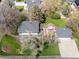 Aerial view of property showcasing the house, garage, patio, landscaping, and yard at 5801 W 33Rd Ave, Wheat Ridge, CO 80212