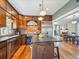 Spacious kitchen with a kitchen island, stainless appliances, and wood cabinetry at 5801 W 33Rd Ave, Wheat Ridge, CO 80212