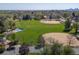 Scenic park showcasing lush green spaces, baseball fields, a playground, and recreational amenities for community enjoyment at 5801 W 33Rd Ave, Wheat Ridge, CO 80212