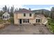 Charming two-story home with a well-maintained yard and ample parking space at 27987 Pine Grove Trl, Conifer, CO 80433