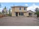 Charming two-story home with a well-maintained yard and ample parking space at 27987 Pine Grove Trl, Conifer, CO 80433