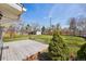 Backyard featuring a wooden deck, green lawn, and partial fencing at 4290 S Cherokee St, Englewood, CO 80110