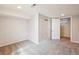Finished basement featuring neutral carpeting, light gray walls, and recessed lighting at 4290 S Cherokee St, Englewood, CO 80110