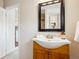 Bathroom showcasing sink with stylish mirror and fixtures at 4290 S Cherokee St, Englewood, CO 80110