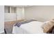 Clean bedroom showcasing a stylish bed and soft textures for relaxation at 4290 S Cherokee St, Englewood, CO 80110