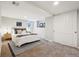 Inviting bedroom features a comfortable bed, minimalist decor, and natural light at 4290 S Cherokee St, Englewood, CO 80110