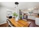 Open concept dining room flows into the kitchen, perfect for entertaining at 4290 S Cherokee St, Englewood, CO 80110