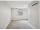 Empty room ready for personalization featuring a window and soft natural lighting at 4290 S Cherokee St, Englewood, CO 80110