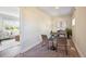 Home office with neutral tones, desk, and view to living room at 4290 S Cherokee St, Englewood, CO 80110
